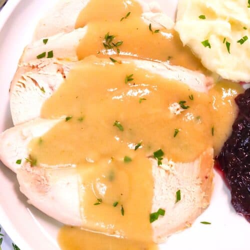 Enjoying turkey and mashed potatoes smothered in homemade gravy.