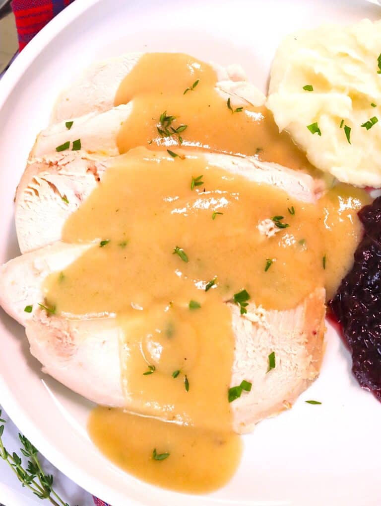 Enjoying turkey and mashed potatoes smothered in homemade gravy.