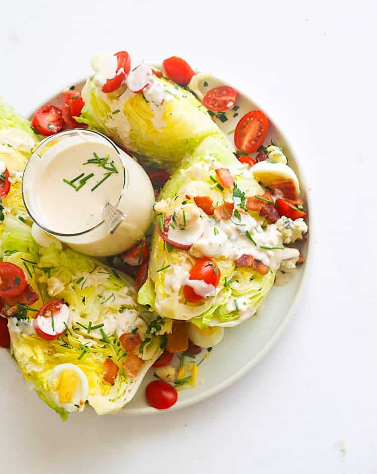 Enjoying blue cheese dressing on a wedge salad.