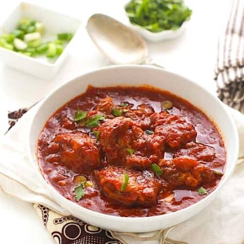 Serving up a bowl of African spicy oxtail stew for healthy comfort food for the family.