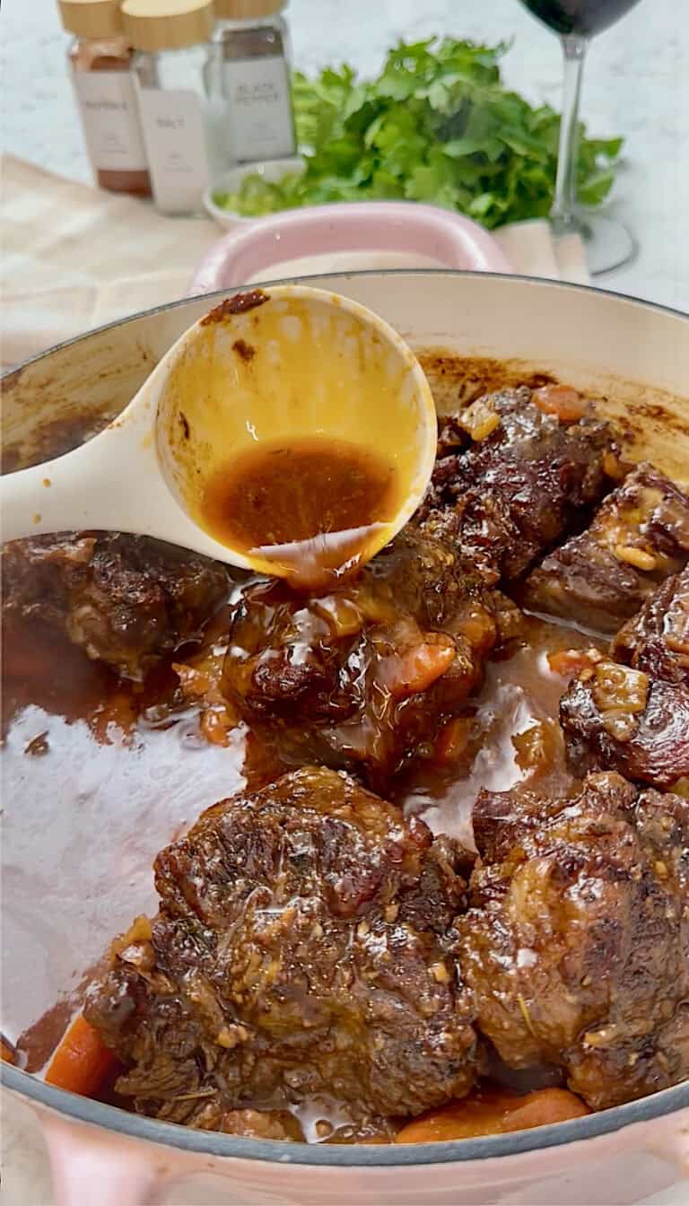 Serving up braised oxtails for a delicious holiday dinner.