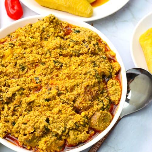 Enjoying a stew made with egusi seeds.