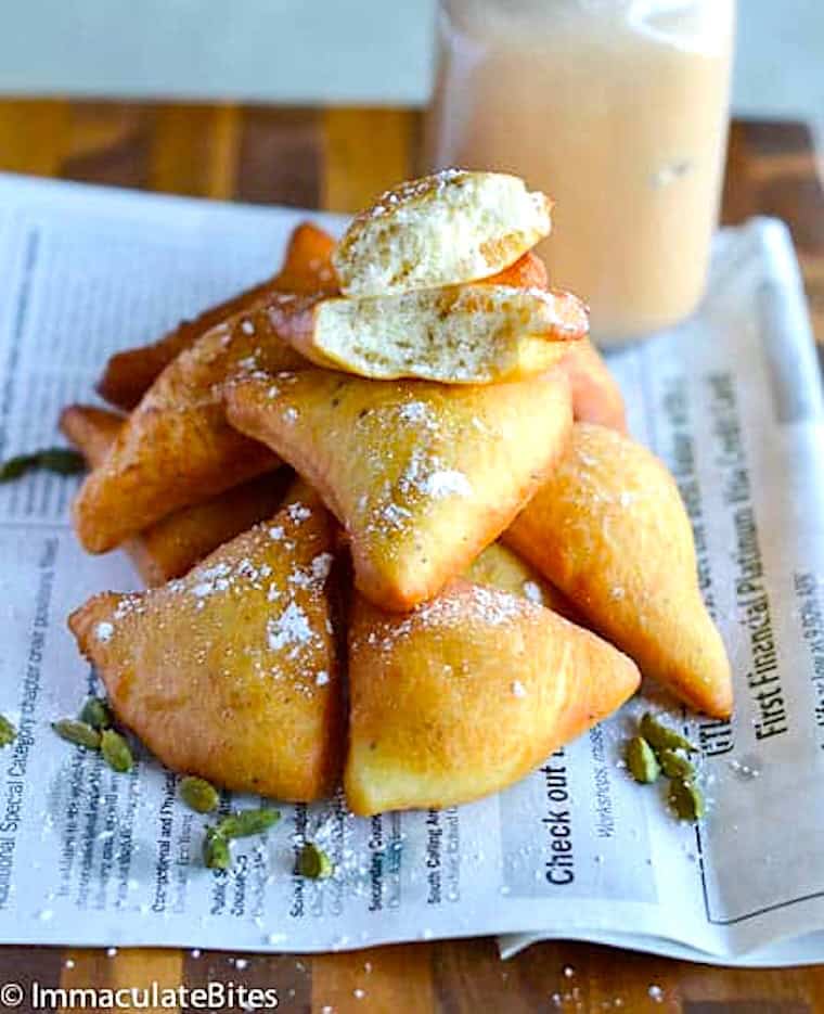 Breaking into a fresh East African doughnut for soul satisfaction.