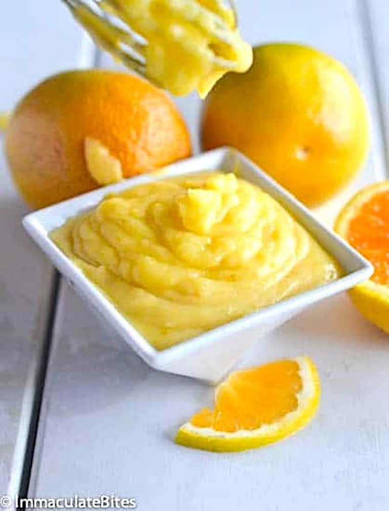 Getting ready to slather biscuits or scones with a orangy homemade spread.