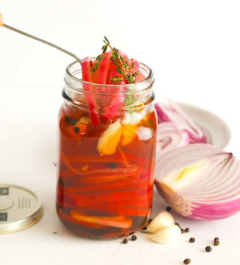 Serving up pickled onions seasoned with thyme.