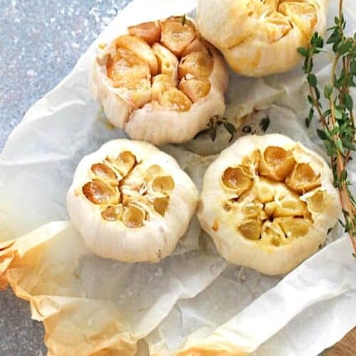 Opening up freshly roasted garlic ready to peel.