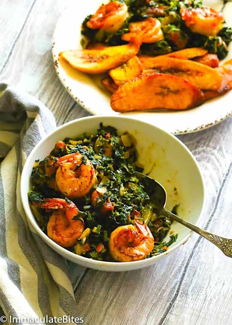 Diving into African style spinach with fried plantains. Boiled plantains work, too.