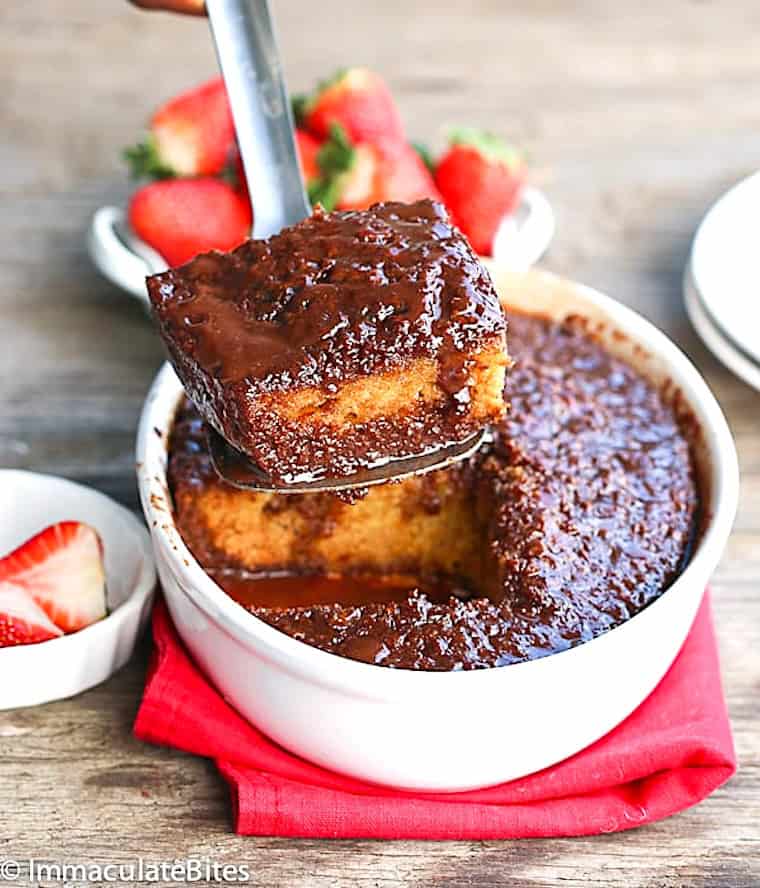 Serving up a scoop of chocolate malva pudding.