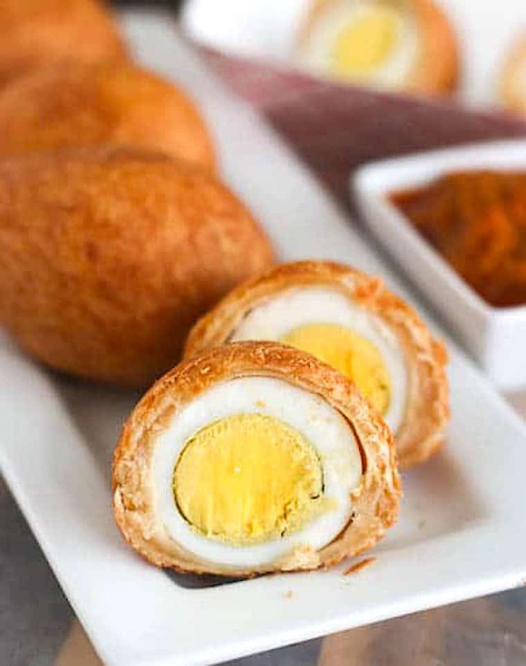 Slicing into a tasty and satisfying scotch egg.