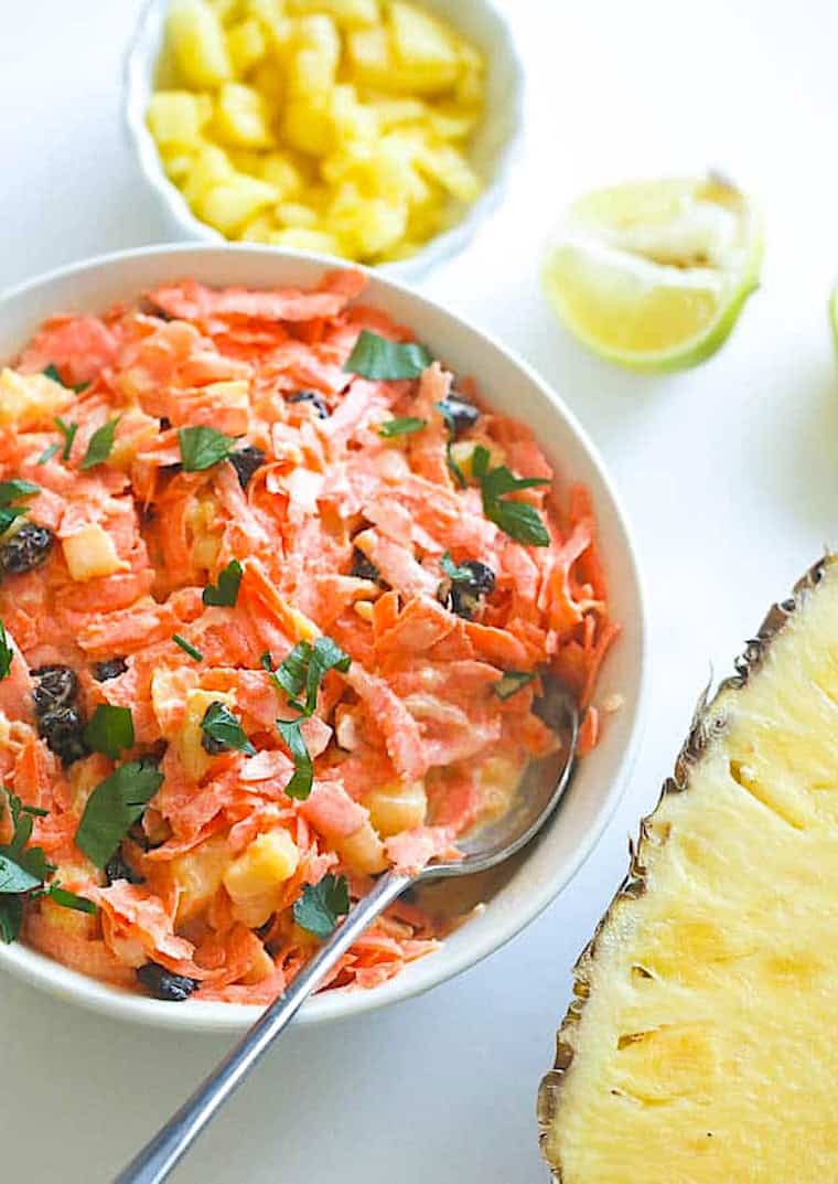 A delicious salad or sneaky dessert enjoying fresh carrots and pineapple.