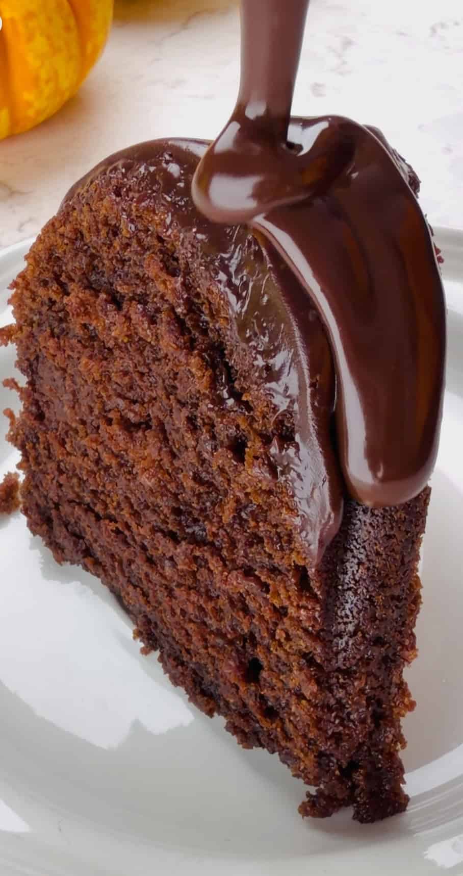 Drizzling a slice of black magic with ganache for an easy and decadent treat.