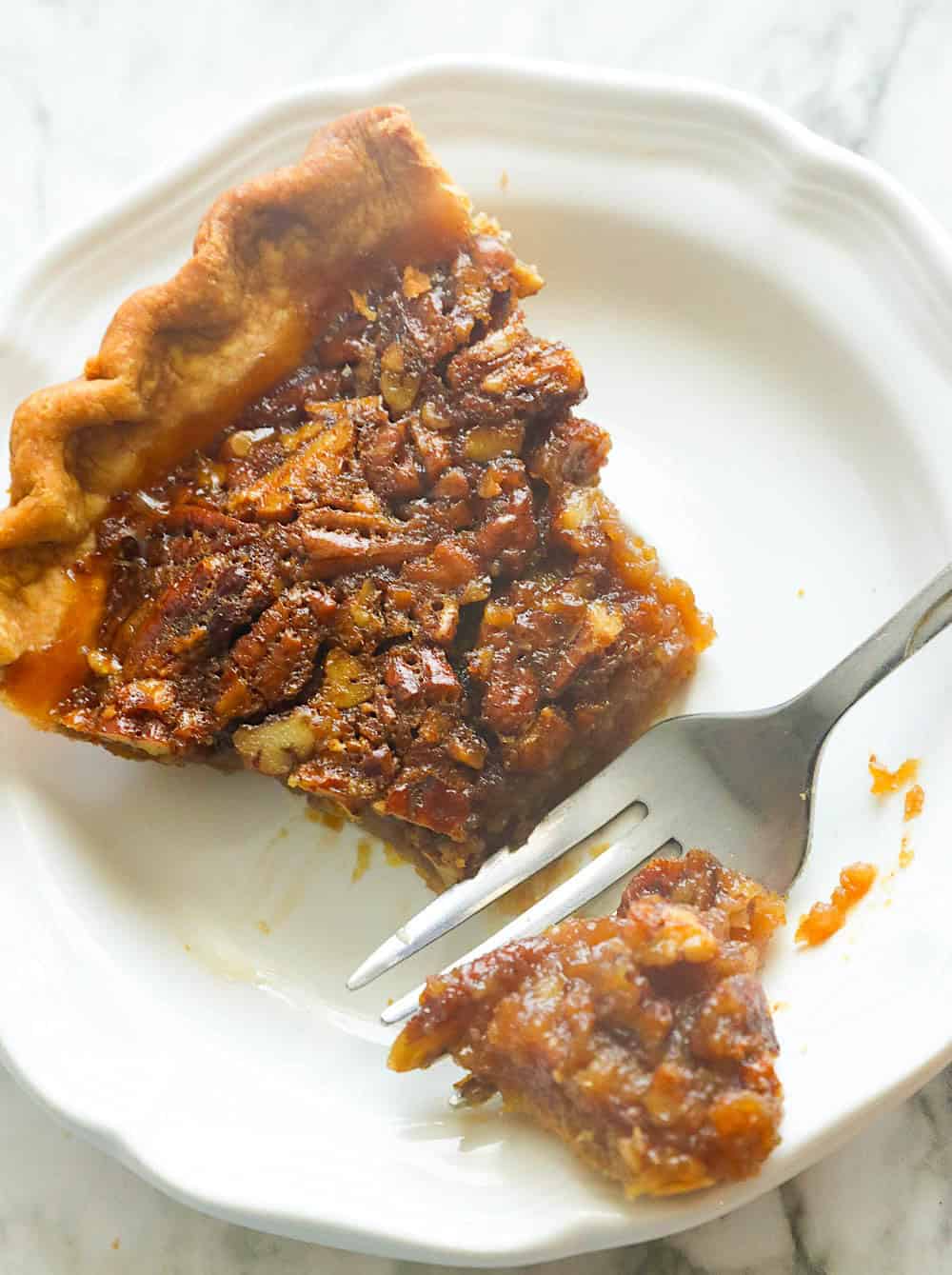 Forking into freshly made pecan pie made even more decadent with bourbon.