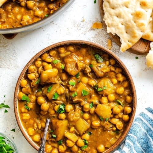 Serving up a comforting bowl of chickpea curry with flatbread for the perfect vegan option.
