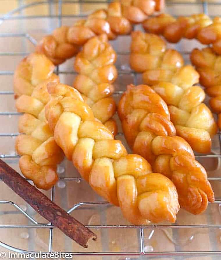 Traditional koeksisters freshly fried and soaked in syrup.