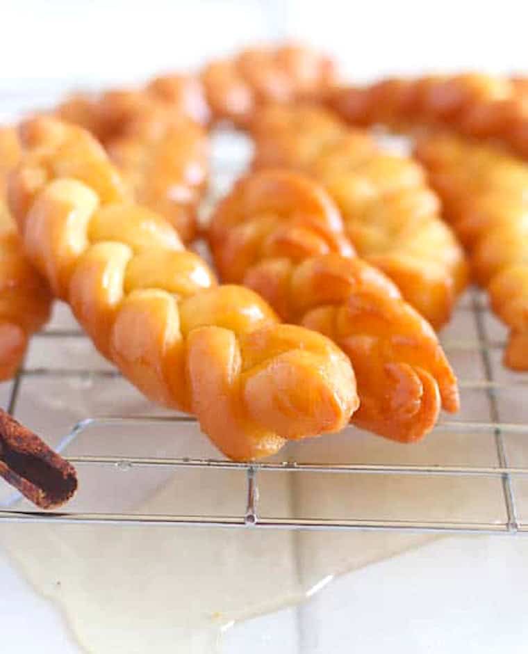 Koeksisters soaked in syrup in the traditional way.