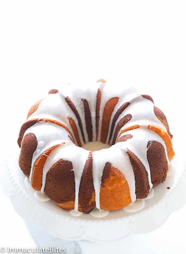 A decadent chocolate rum marble cake drizzled with vanilla and chocolate glaze.