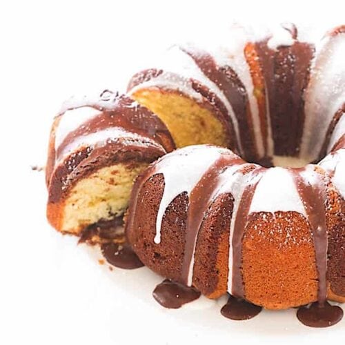 Serving up a slice of marble cake with vanilla, chocolate, and rum flavors.