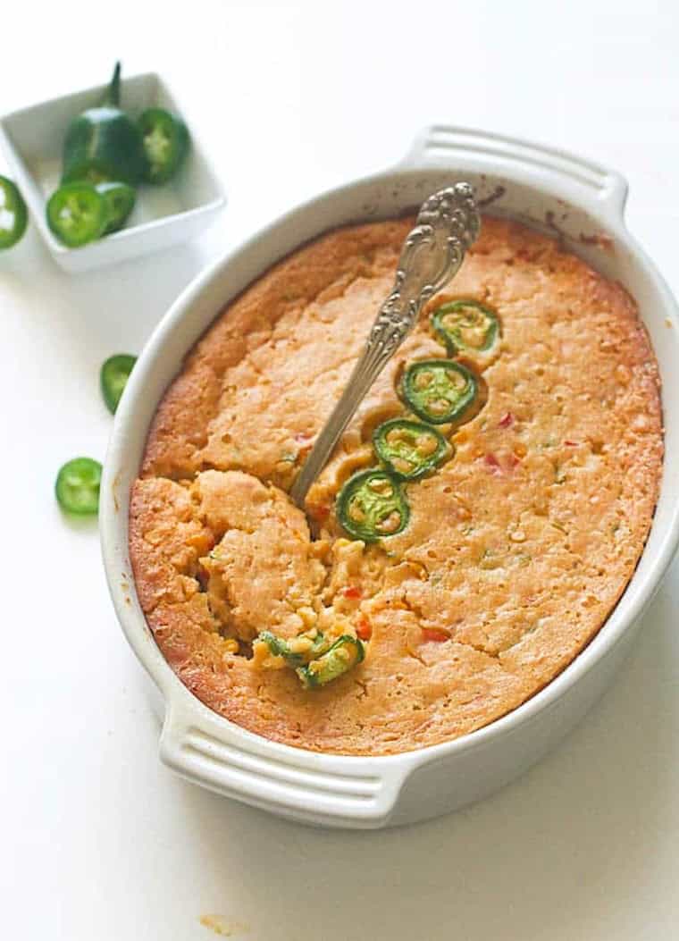 Serving up a corn casserole spiced up with jalapenos.
