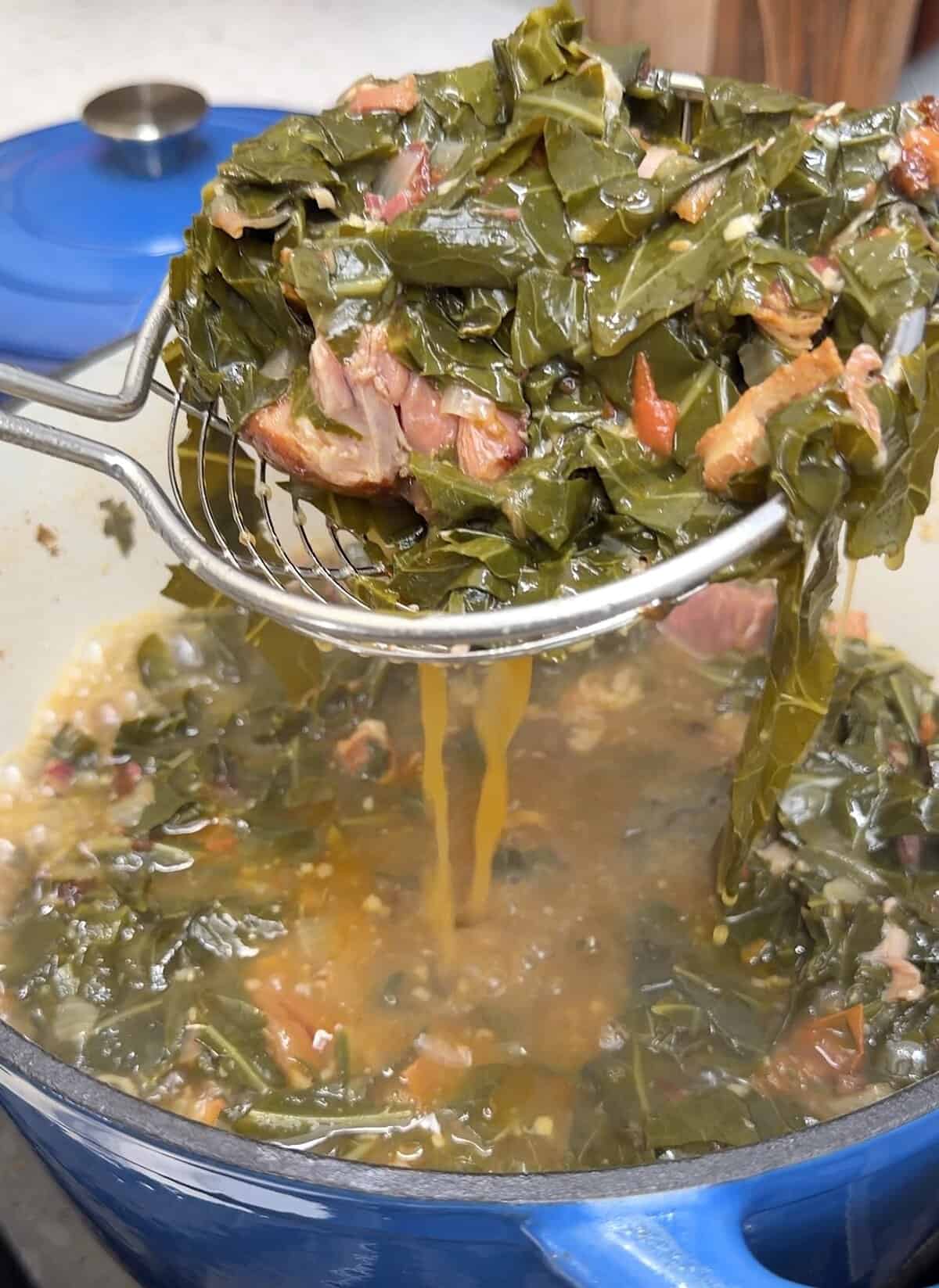 Serving up collards fresh from the pot.