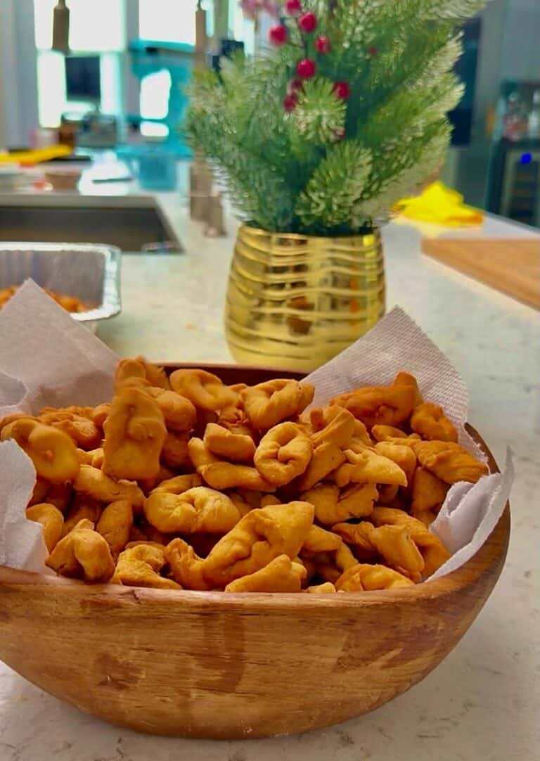 Crispy crunchy chin chin folded into decorate shapes for Christmas.