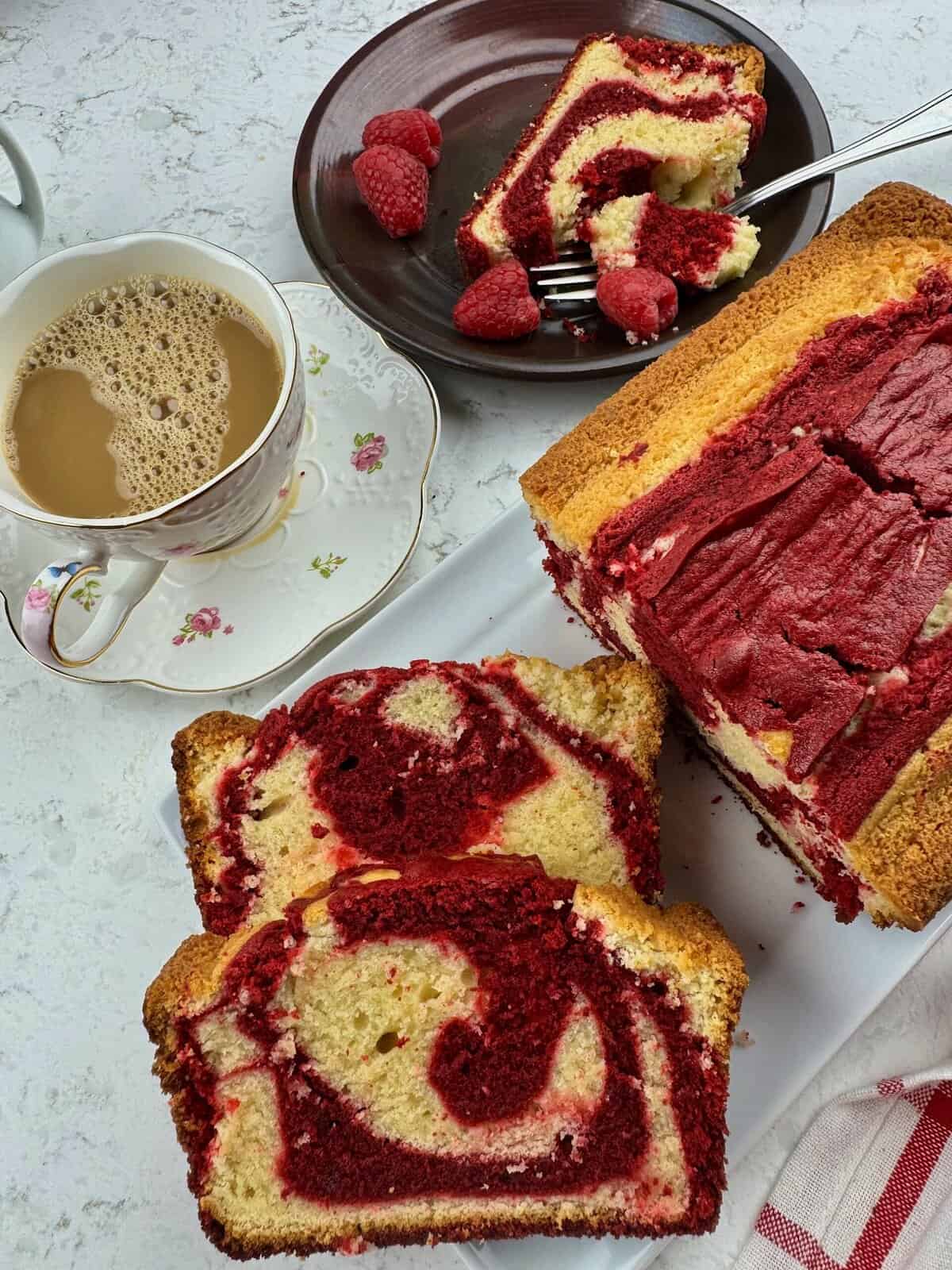 Enjoying vanilla pound cake marbled with red velvet chocolate for an impressive dessert.