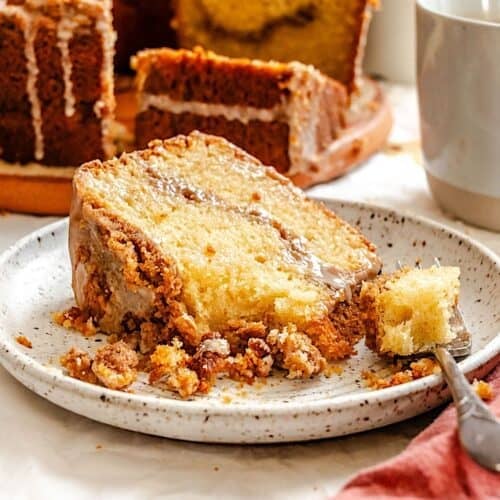 Forking into a decadent slice of coffee cake made even more moist with sour cream.