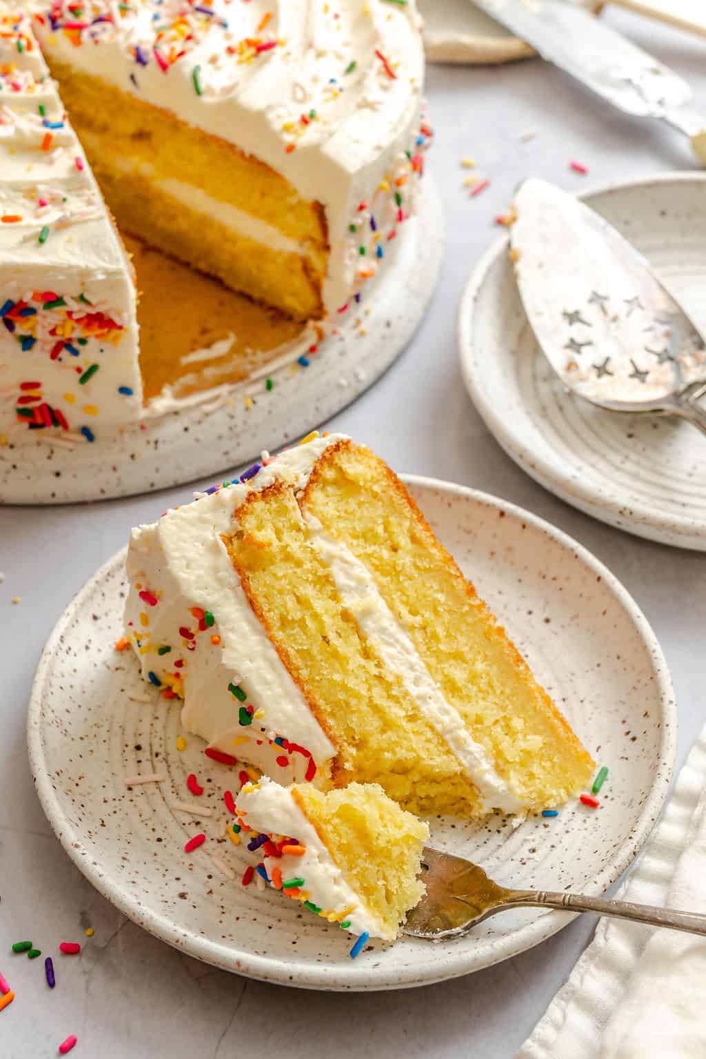 Forking into a decadent slice of cake.