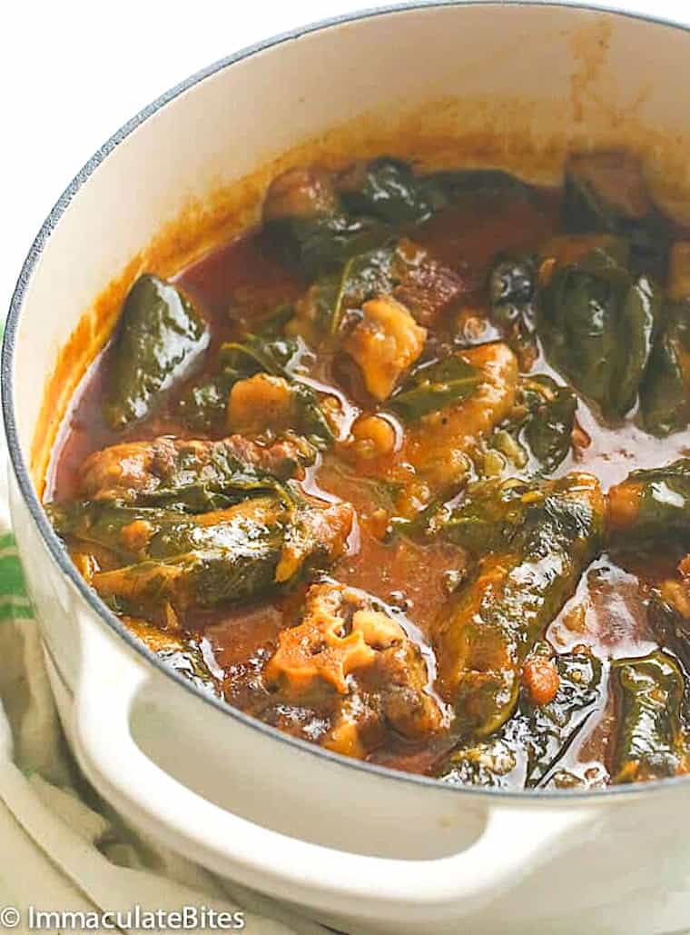 Enjoying a pot of ekwang, a Cameroonian comfort food.