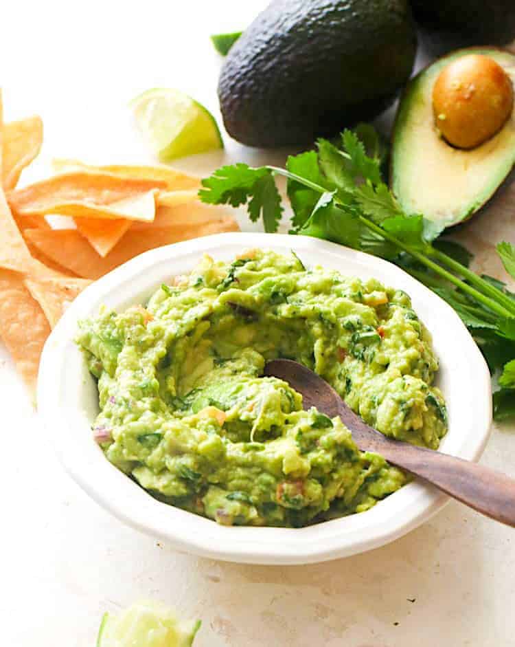 Serving up a bowl of freshly made guacamole.