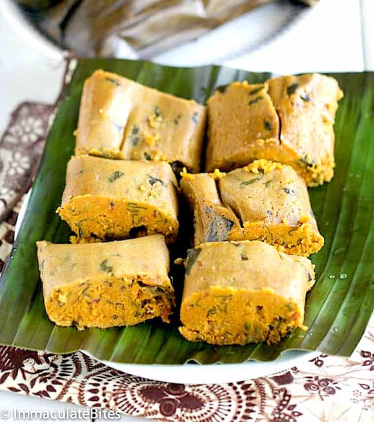 A plateful of kwacoco bible on a banana leaf lined plate.
