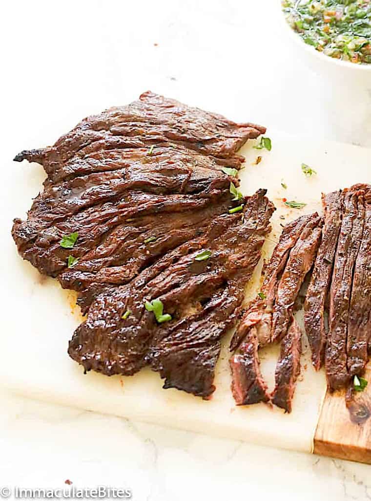 Slicing up beef fresh off the grill and rested.