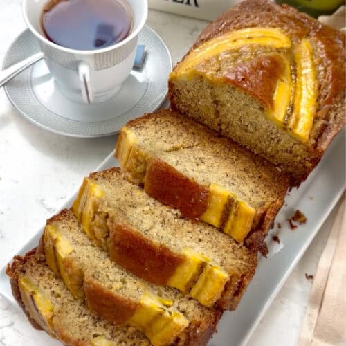 Freshly baked plantain bread, sliced and ready to enjoy.