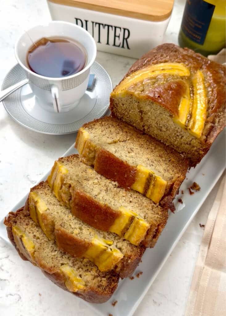 Freshly baked plantain bread, sliced and ready to enjoy.