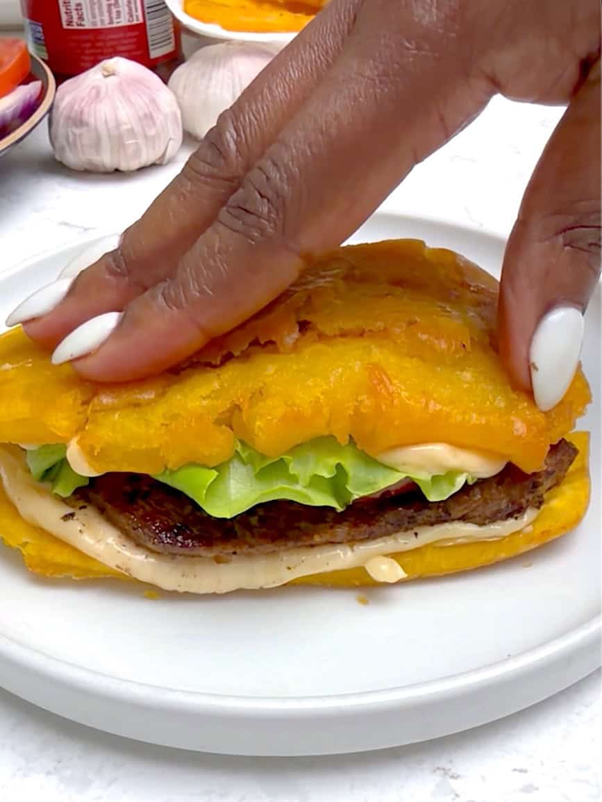 Putting the top on the perfect sandwich.