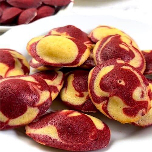 Red velvet madeleines fresh from the oven and ready to serve as a sweet snack or dessert.