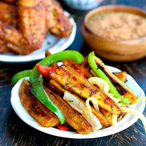 Roasted plantains with jerk seasoning, onions, and bell peppers.