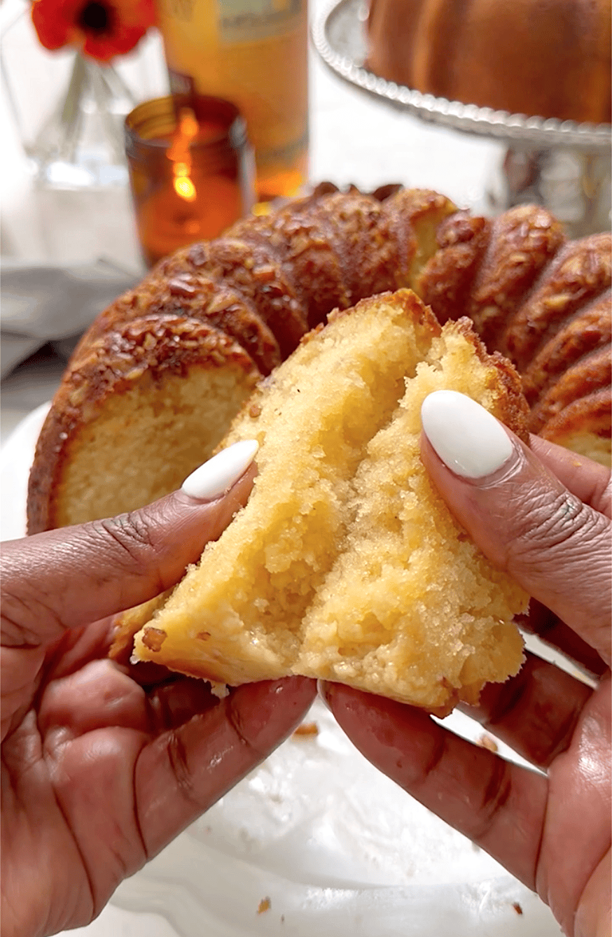 Breaking open a tender cake soaked with rum.