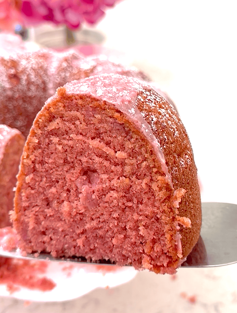 Serving up a slice of pound cake flavored with strawberries.