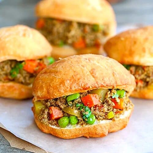 Freshly assembled vetkoek with the minced curry meat.