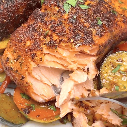 Forking into a flaky, tender salmon fillet spiced up with blackening.