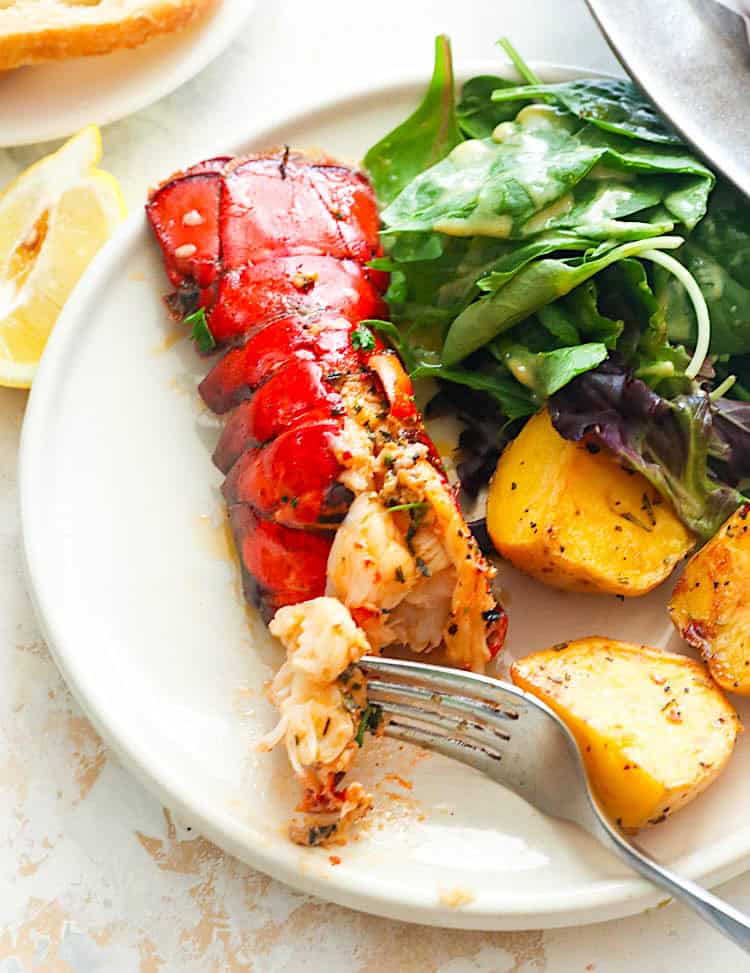 Forking into delicate and buttery lobster tail fresh from the oven with roasted potatoes and a gorgeous green salad. 