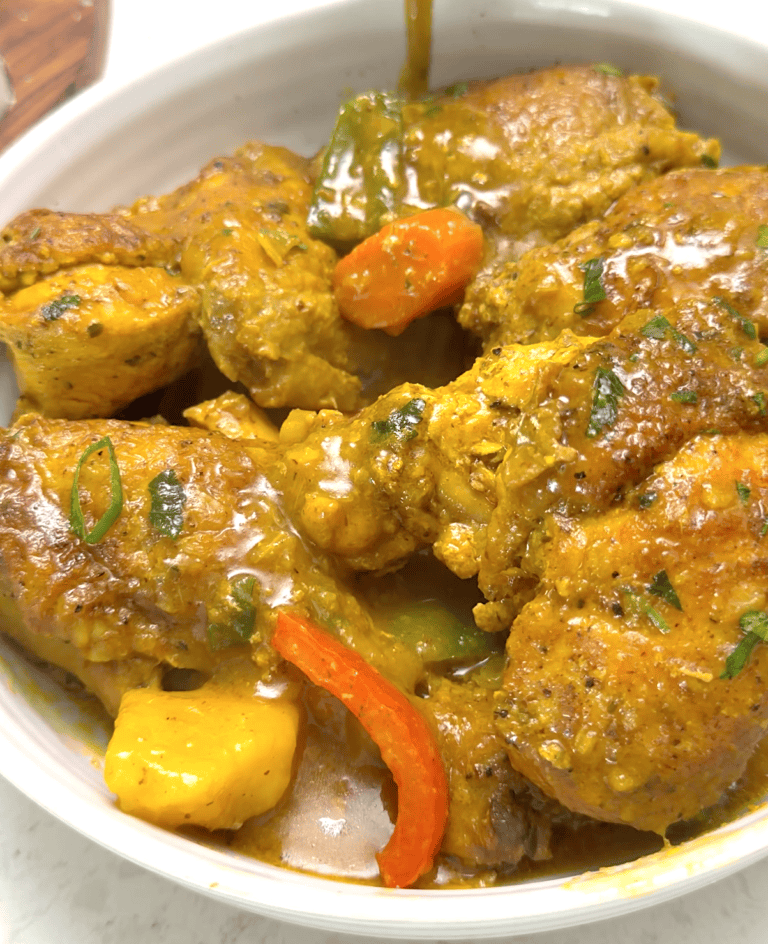 A comforting bowl of Jamaican curry chicken ready to satisfy your soul.