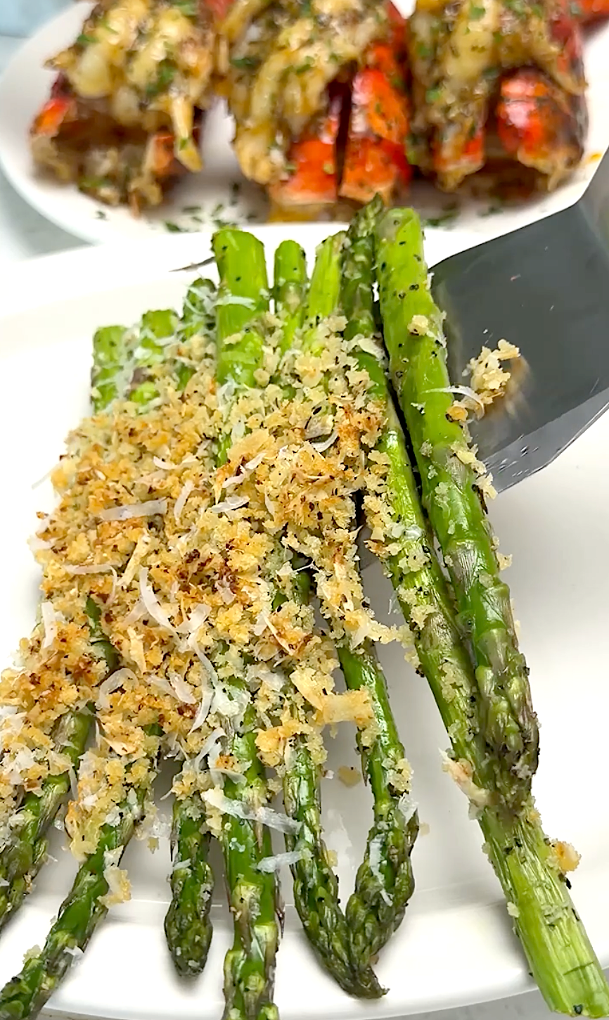 Serving up freshly baked asparagus topped with a cheesy breadcrumb topping.