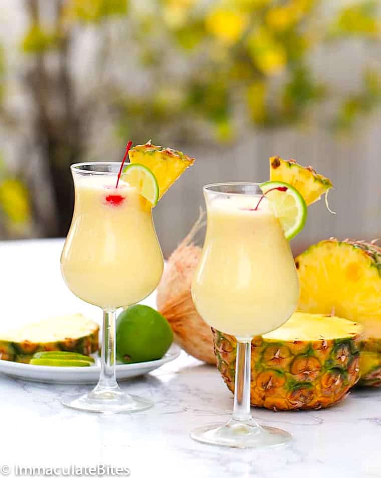 Two refreshing tropical cocktails with coconut and pineapple.