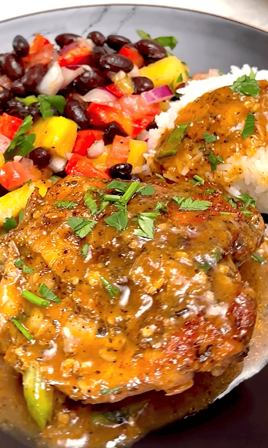 Serving up freshly baked chicken in a pineapple sauce with a pineapple bean salad and coconut rice.