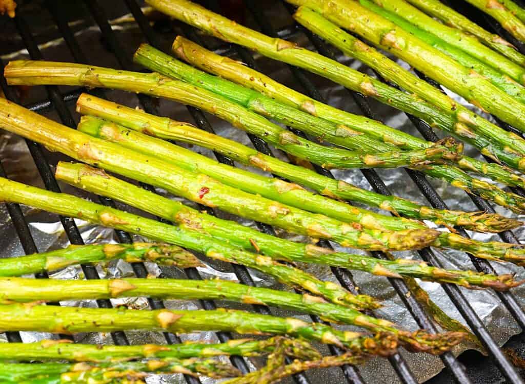 Getting ready to pull smoked asparagus from the pellet grill for a healthy side.
