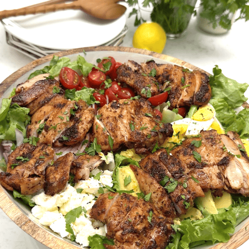 Getting ready to enjoy A Cajun chicken avocado salad for a healthy and satisfying main-dish salad.