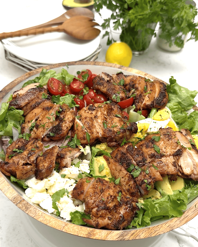 Getting ready to enjoy A Cajun chicken avocado salad for a healthy and satisfying main-dish salad.