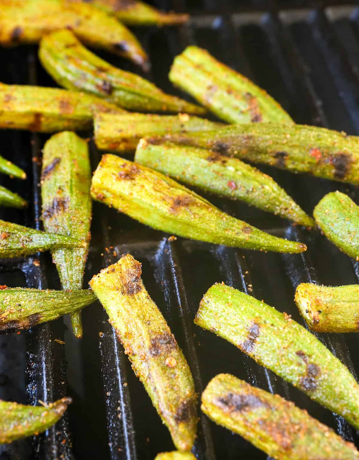 Getting ready to take the okra off of the grill.