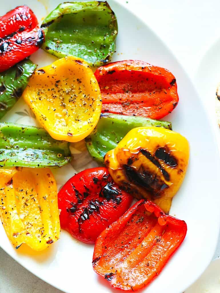 Enjoying peppers fresh from the grill.